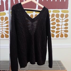 Black open back knitted sweater